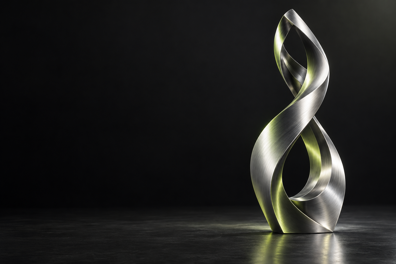 Sculptural silver form rising into an open loop